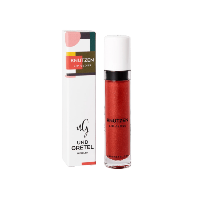 UND GRETEL KNUTZEN Lip Gloss 08 Sunrise Red Shimmer, Verpackung und Flasche, auf weißem Hintergrund.