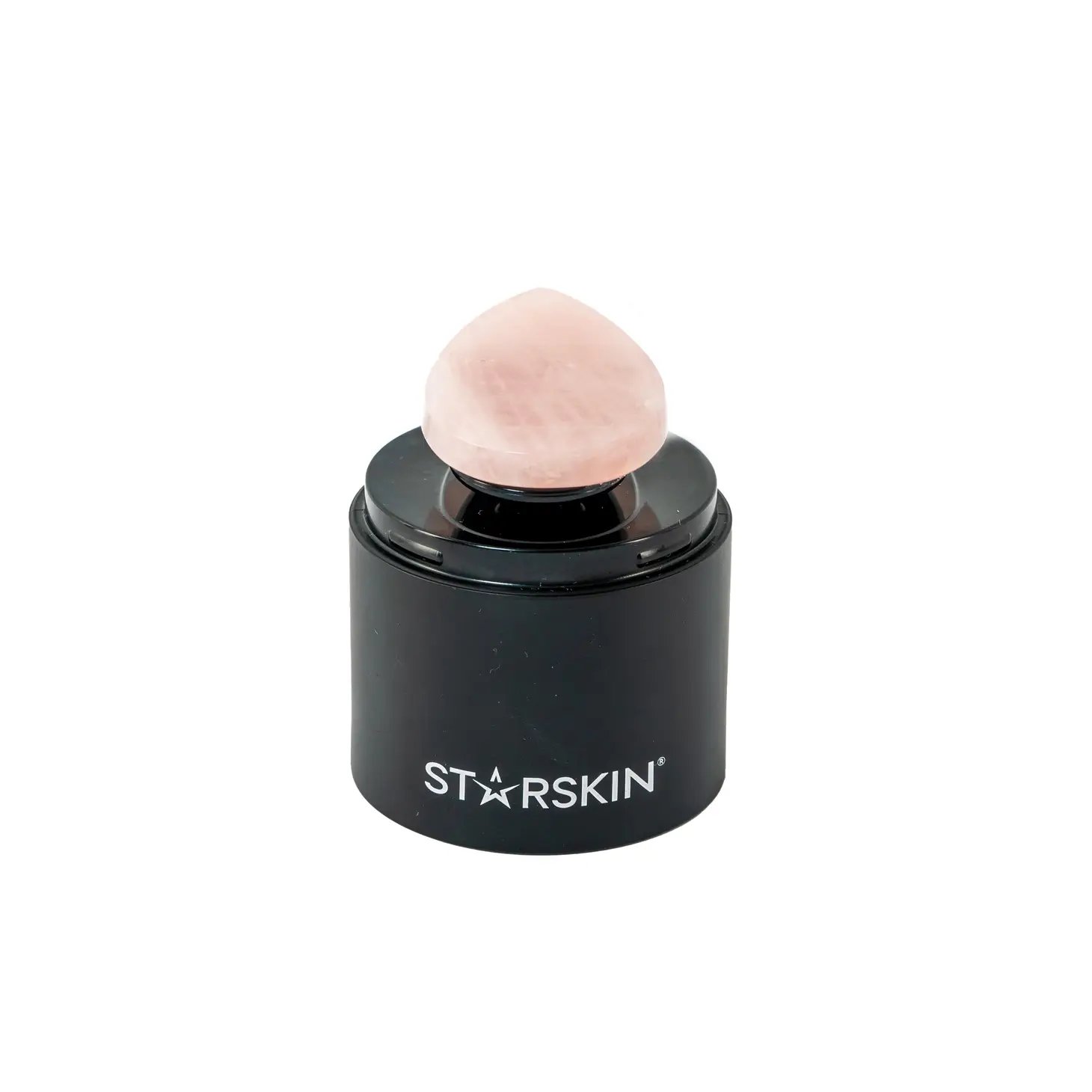 Starskin Gesichtsroller aus Rosenquarz auf schwarzem Sockel.