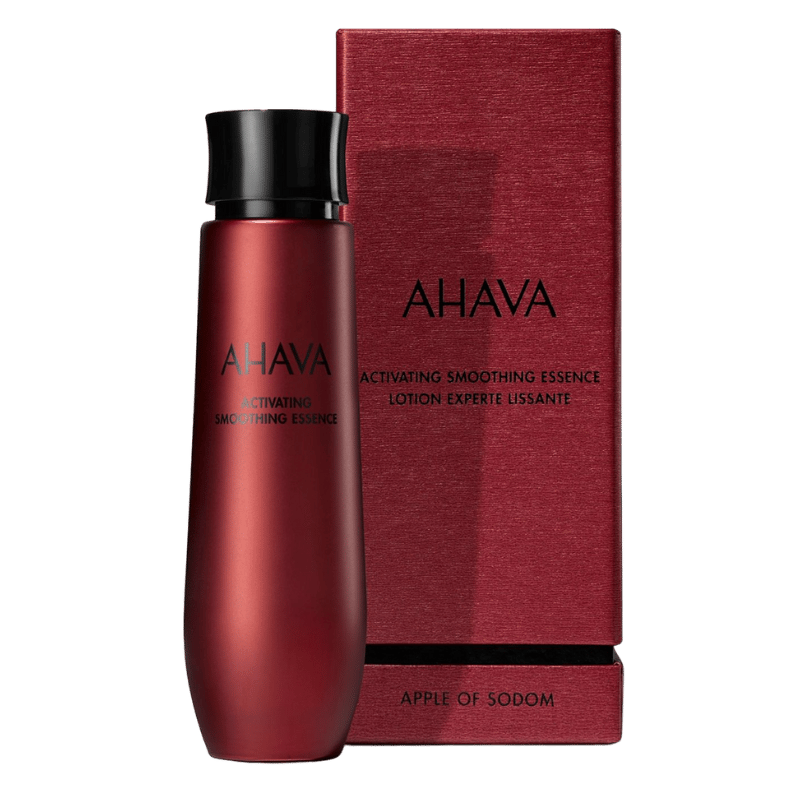 AHAVA Activating Smoothing Essence in roter Flasche vor roter Verpackung.