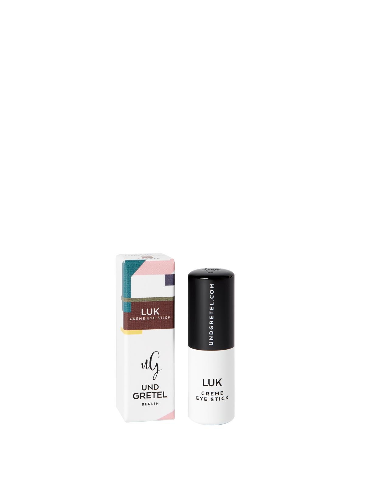LUK Creme Eye Stick von Und Gretel Berlin, Verpackung und Produkt nebeneinander.
