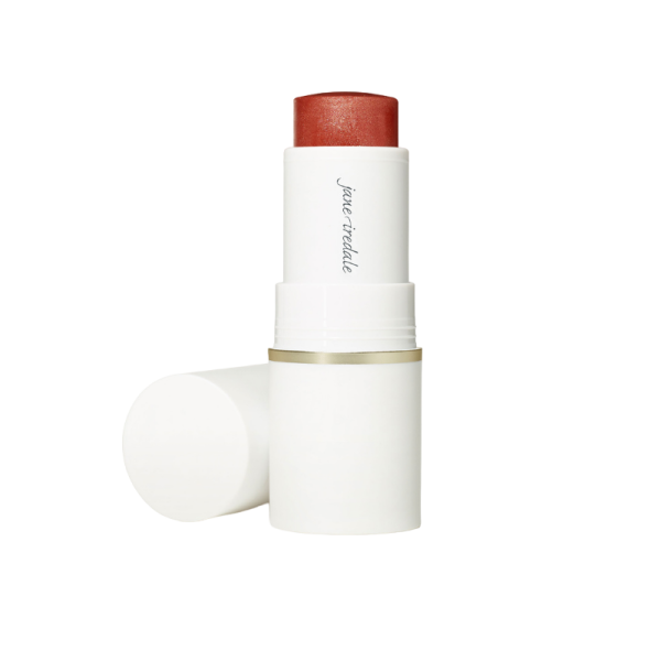 Glow Time Blush Stick in Aura, offener weißer Behälter mit rotem Rouge-Stick.