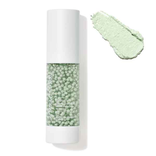 Jane Iredale HydroPure Color Correcting Serum in weißer Flasche, daneben grüne Creme.