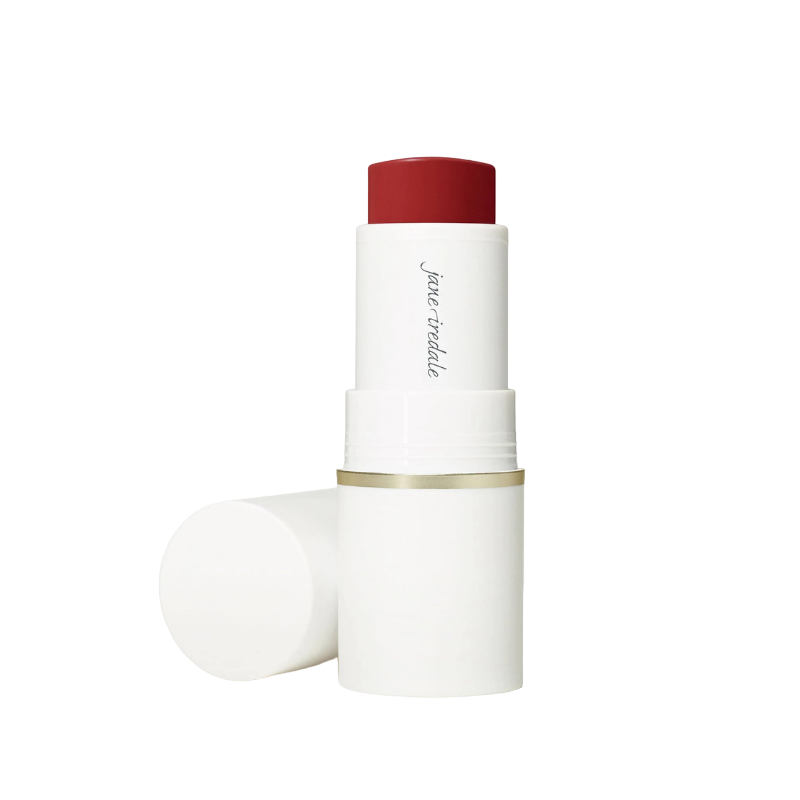Ein geöffneter Blush-Stick in Rot von Jane Iredale, aufrecht stehend mit abgenommenem Deckel.