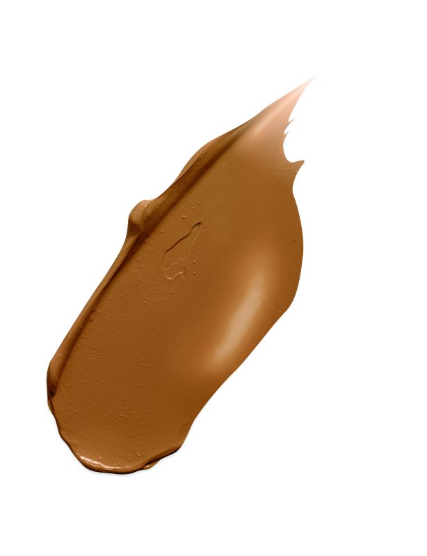 Nahaufnahme eines braunen Concealer-Farbtons auf weißem Hintergrund.