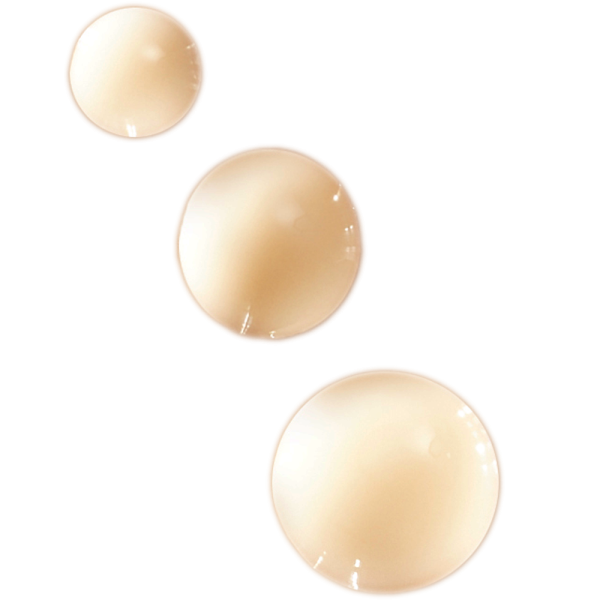Drei Tropfen des Night Star Serums auf weißem Hintergrund.