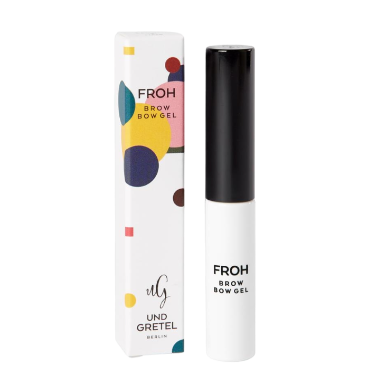 UND GRETEL FROH Brow Bow Gel 1 Natural, weiße Tube mit schwarzem Deckel, bunte Verpackung im Hintergrund.
