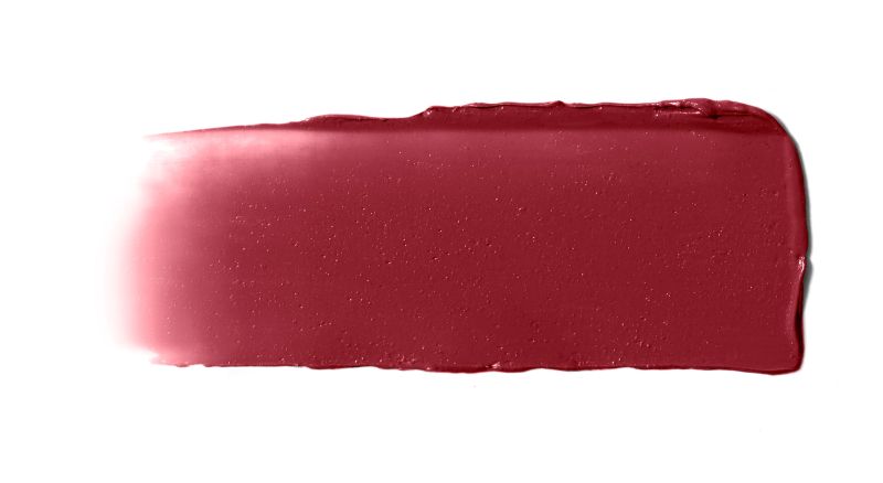 Roter Lippenstiftstrich auf weißem Hintergrund.