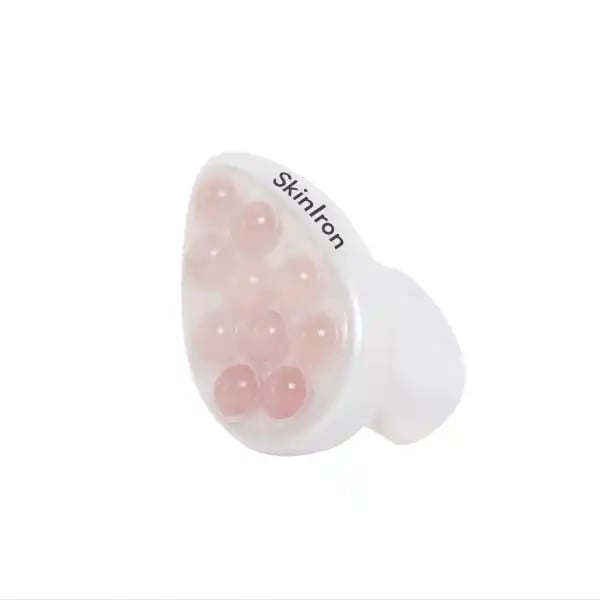 Weißer SkinIron-Massager mit neun rosa Massagekugeln, Produktbild auf weißem Hintergrund.